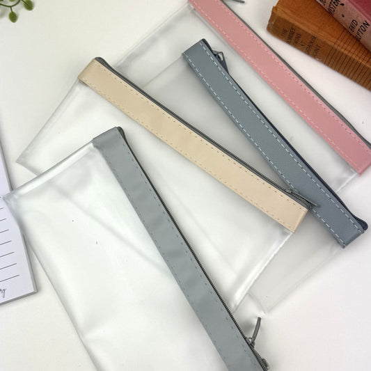 Pencil cases, frosted PVC with coloured zip closure