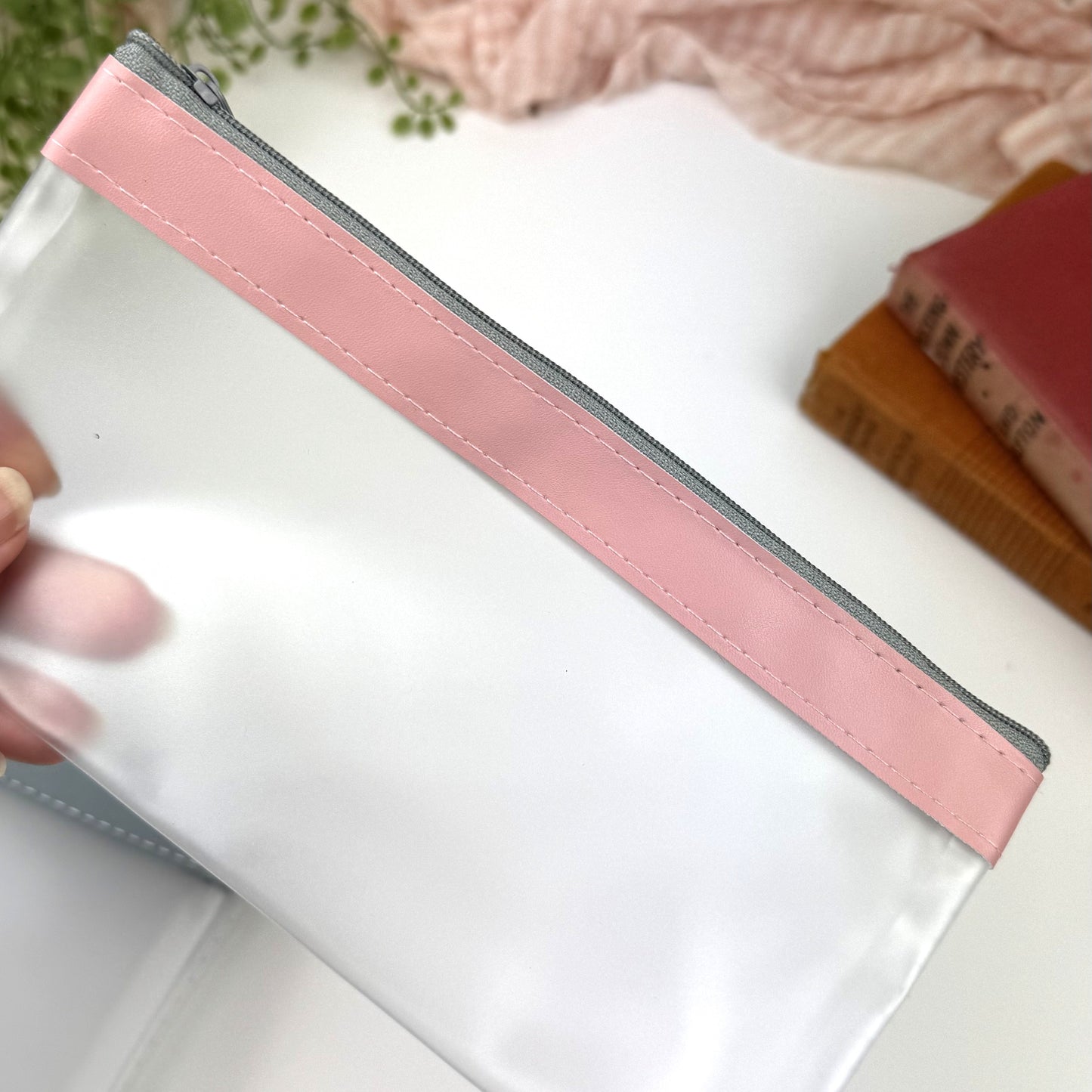 Pencil cases, frosted PVC with coloured zip closure